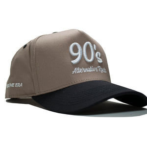 Black and cream 90s Alternative Rock snapback hat featuring bold 3D embroidered design. Retro Lids adjustable snapback inspired by 90s alt-rock style.