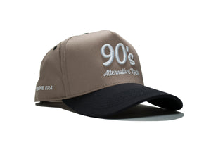 Black and cream 90s Alternative Rock snapback hat featuring bold 3D embroidered design. Retro Lids adjustable snapback inspired by 90s alt-rock style.