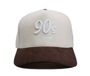 90s grunge hat The Unplugged in tan and brown suede, showcasing the retro 90s style with embroidered lettering.