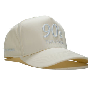 90s New York hat featuring bold black 3D embroidered lettering, inspired by classic NYC street culture. Adjustable snapback design by Retro Lids.